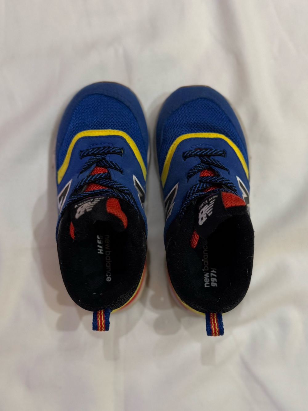 New Balance Kids Blue and Yellow Sneakers with Red Accents